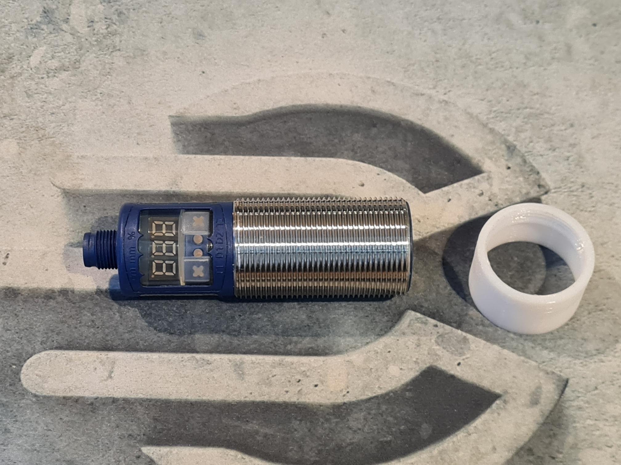 Material level sensor protective cover